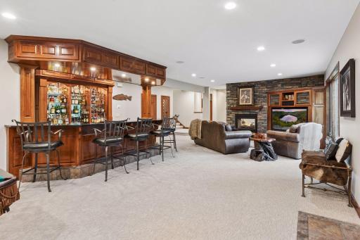The expansive lower level offers incredible space for entertaining, relaxing, and elevated everyday living.