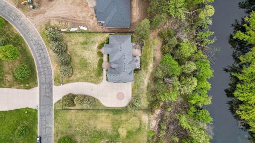 Set on 1.16 acres, this exceptional property offers a rare sense of privacy, space, and peaceful luxury surrounded by nature.
