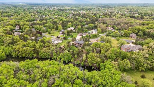Situated among tranquil natural surroundings with access to approximately 25 acres of private association land along the Rum River.