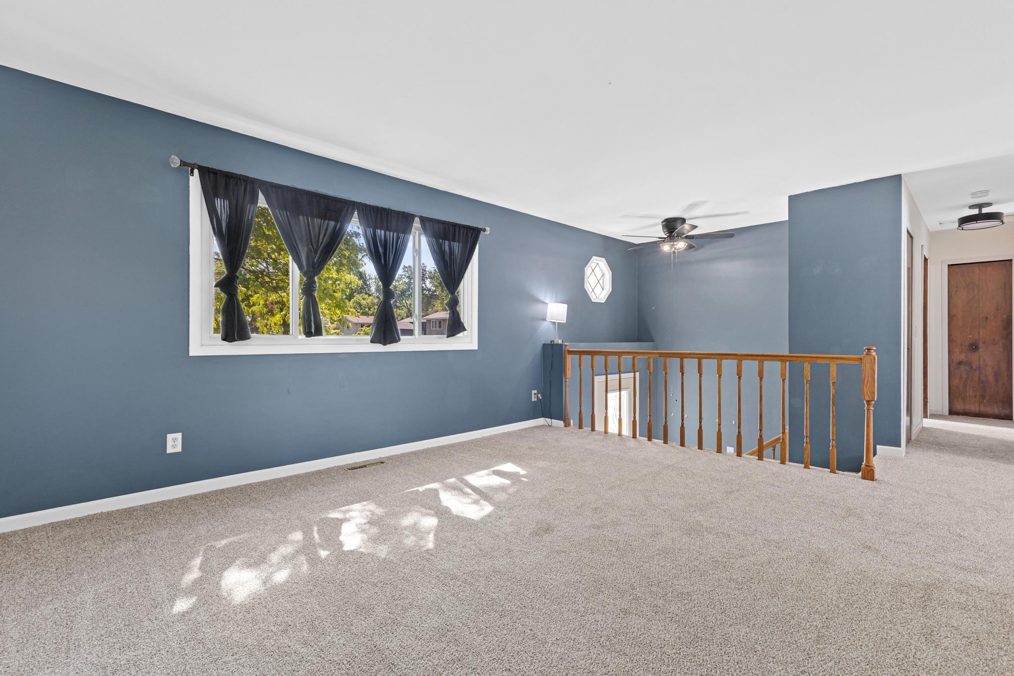 This refreshed split-entry home offers 3 bedrooms and 2 bathrooms with fresh paint and new carpet throughout.