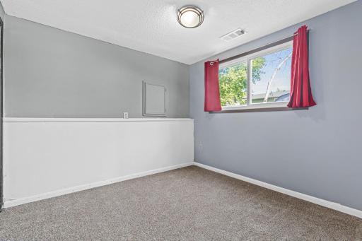Third bedroom, located on the lower level.