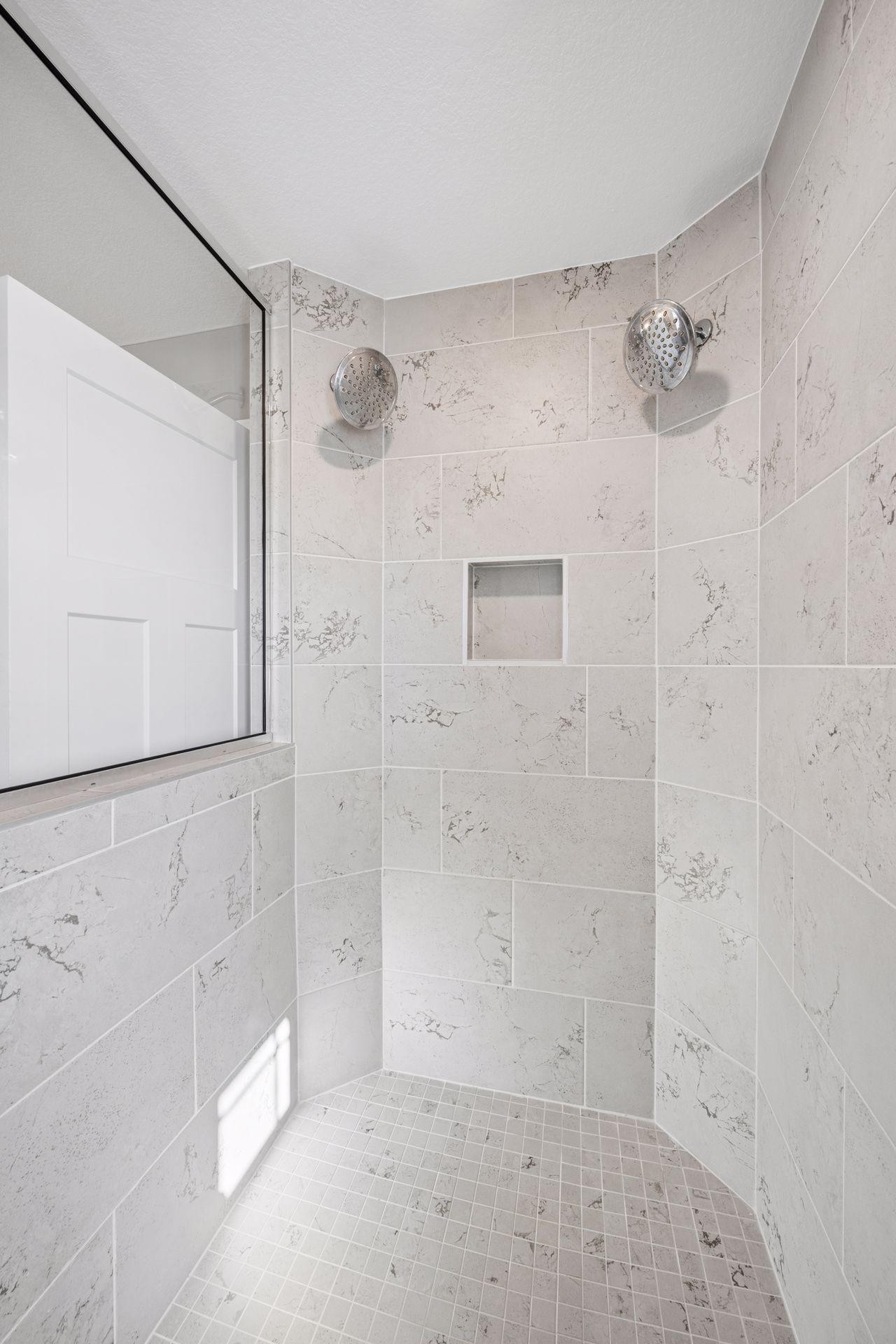Walk in shower with double shower heads