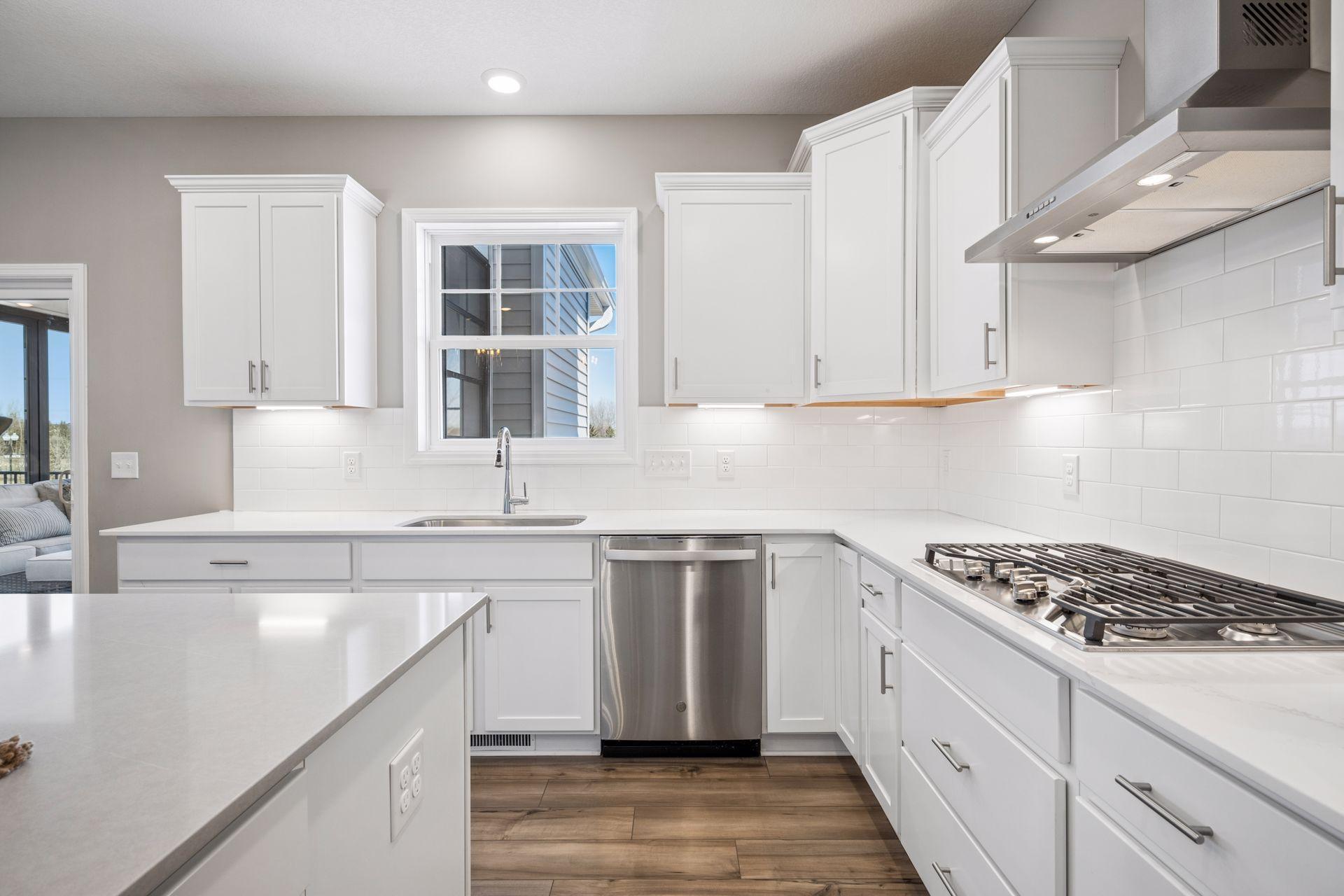 Kitchen window overlooking private backyard