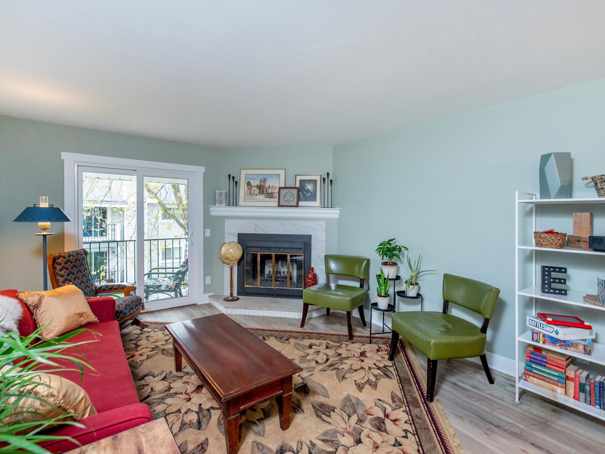 1736 Pleasant #A totally remodeled condo wood burning fireplace with quartz surround. NuCore vinyl flooring throughout.