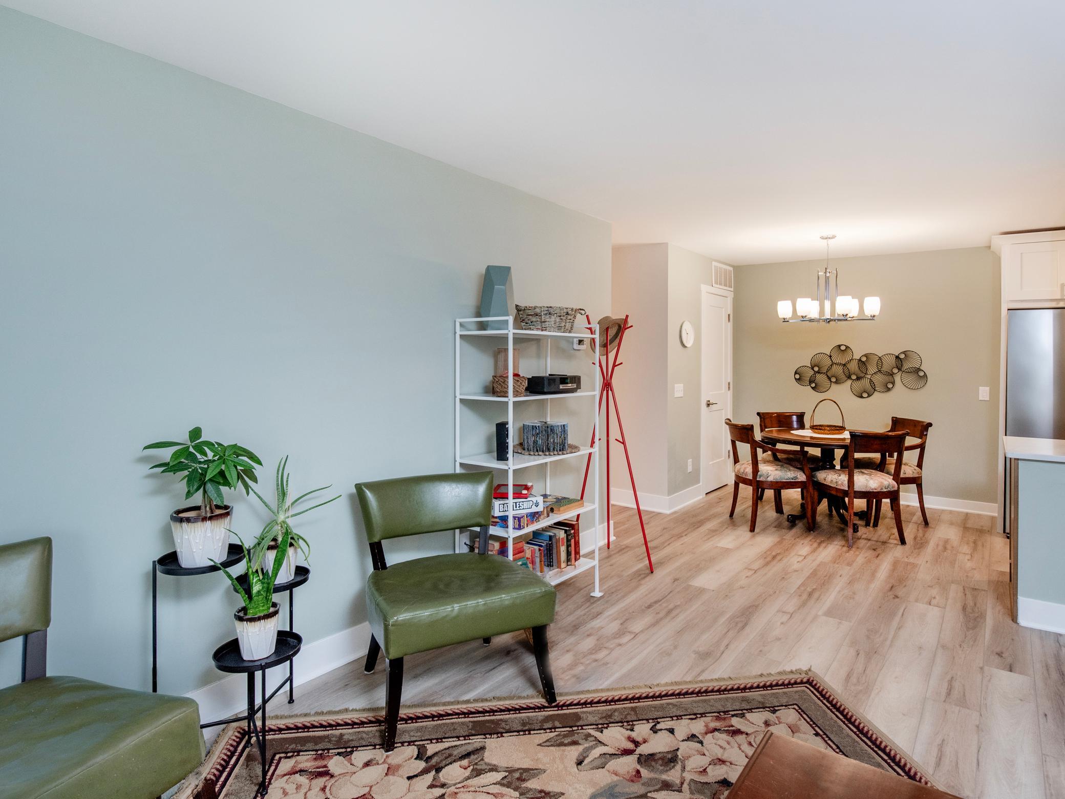 Open living space between living room, informal dining and the kitchen