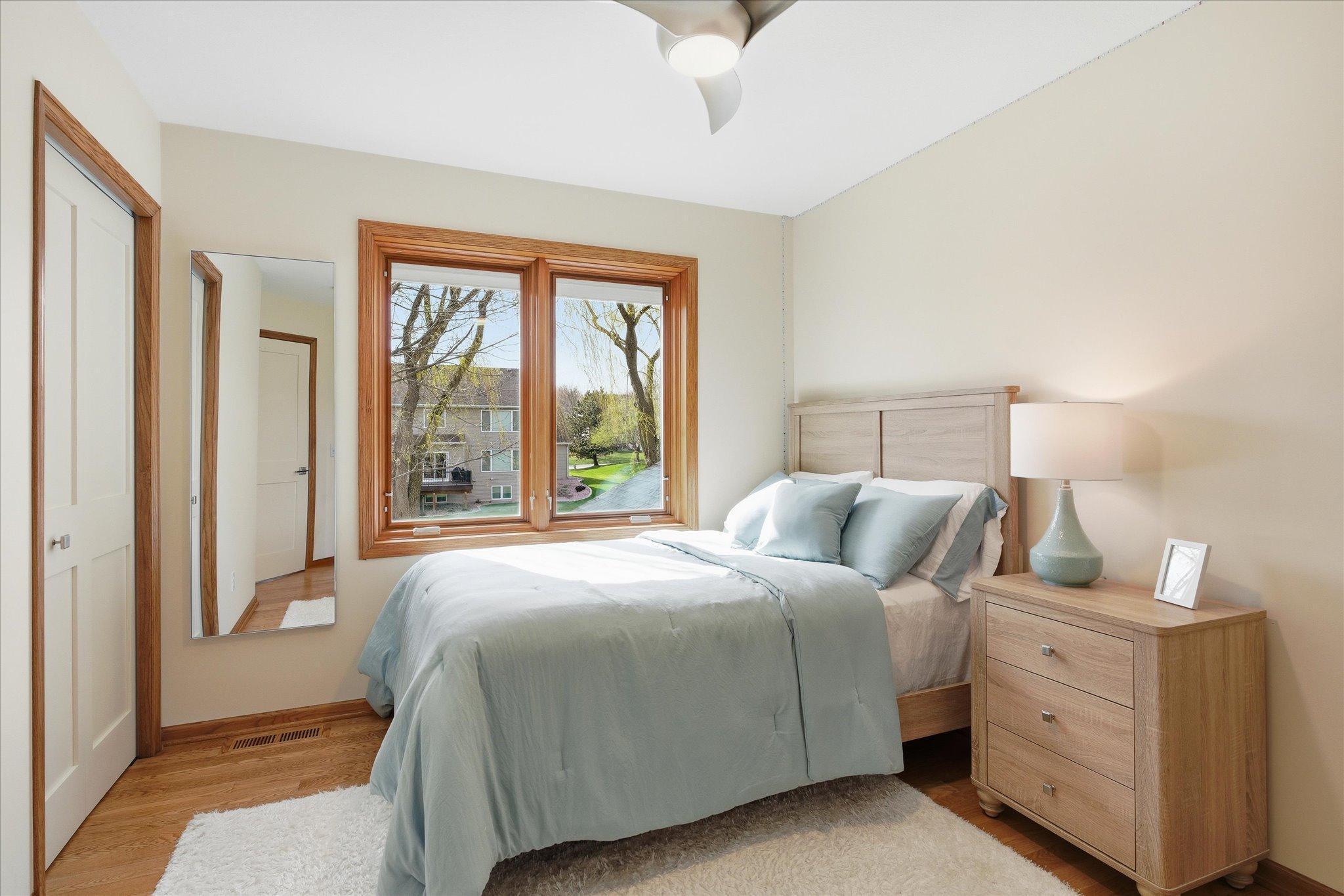 Bedroom #2 with solid wood flooring.