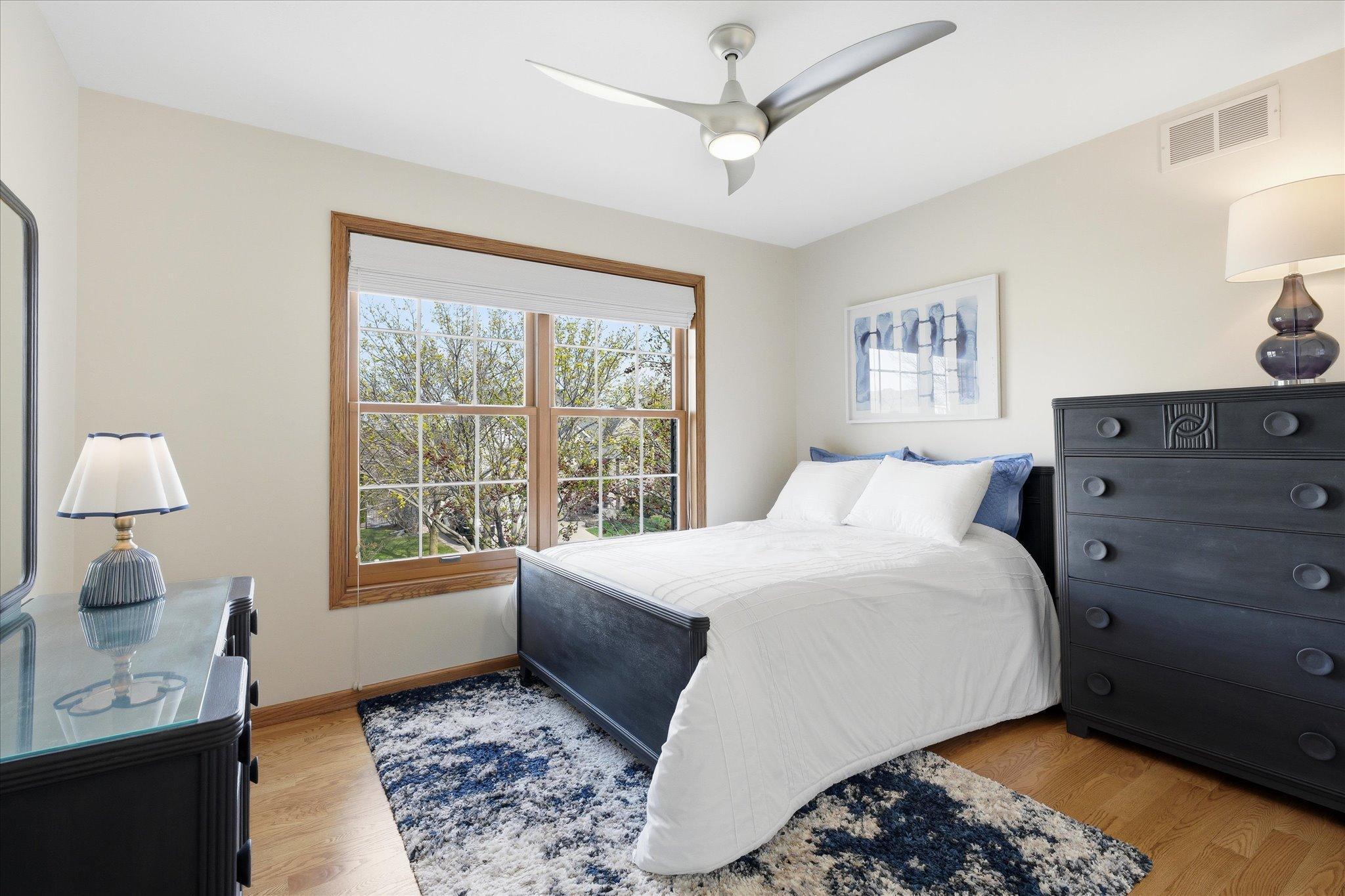 Bedroom #4 with solid wood flooring.