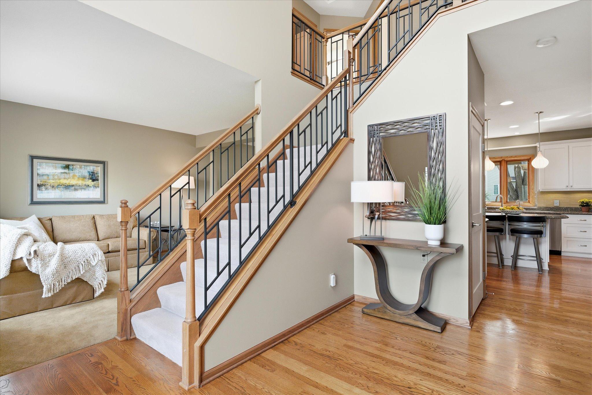 Staircase accented with custom iron.