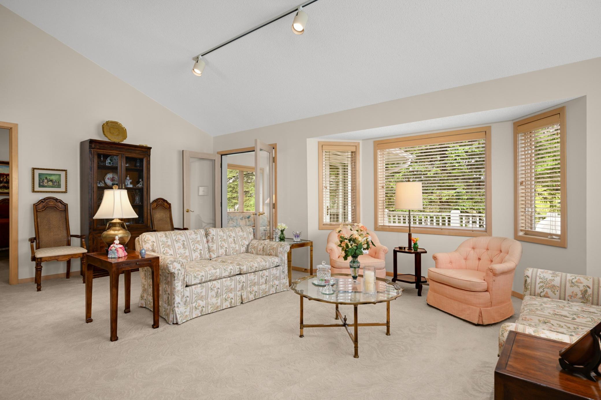 French doors from the living room to the sunroom