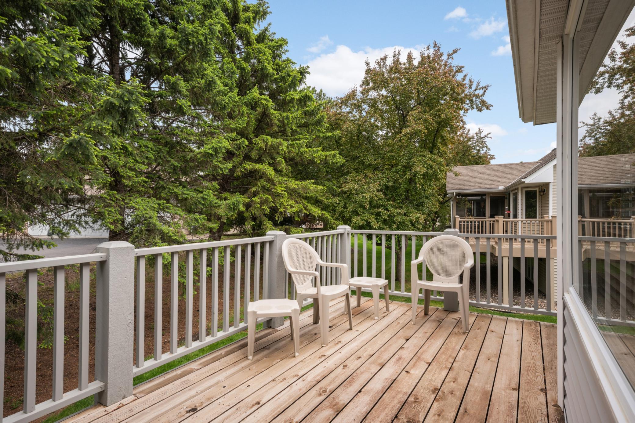 A terrace door to the private relaxing deck for barbequing and summer entertaining.