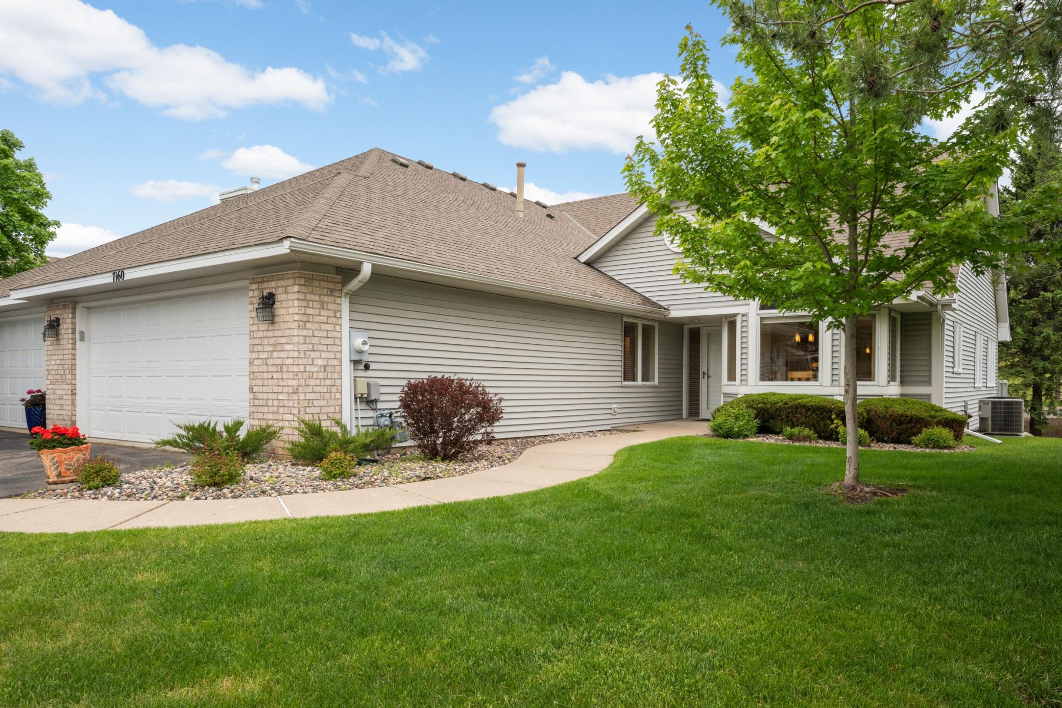 Wonderful main level living townhome in a high demand peaceful neighborhood in West Bloomington.