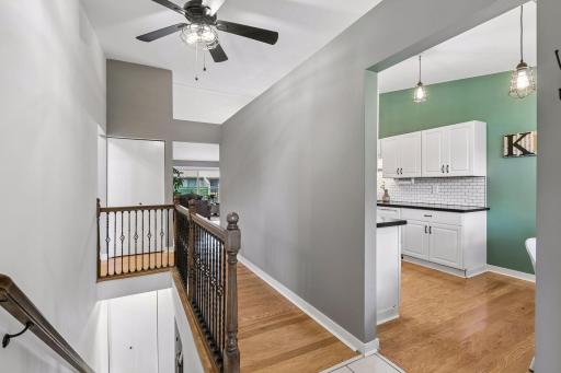 Front entry opening to kitchen and central hallway.