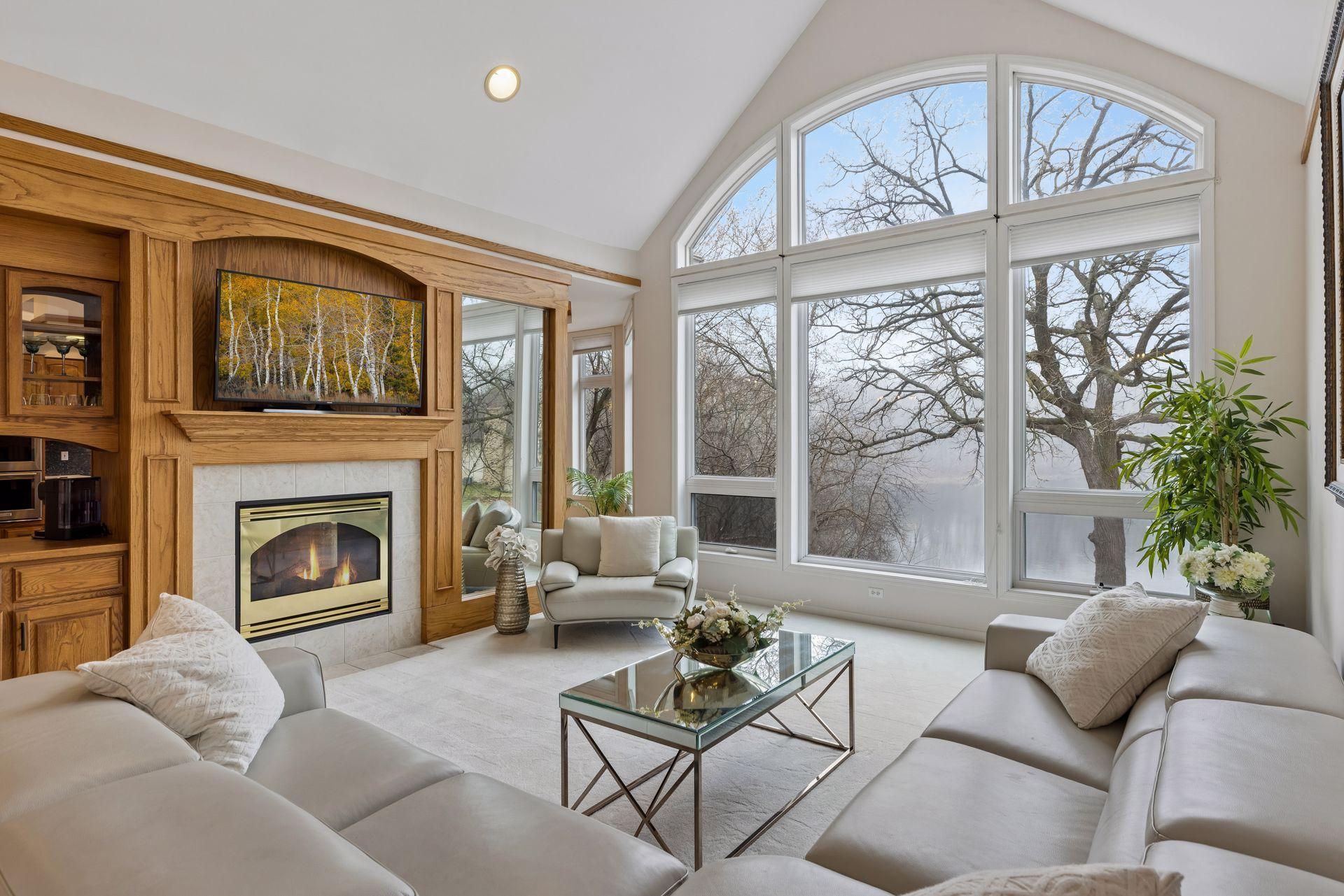 Custom built-ins and a beautifully detailed fireplace add both character and functionality, while the open layout offers an ideal setting for everyday living and effortless entertaining.