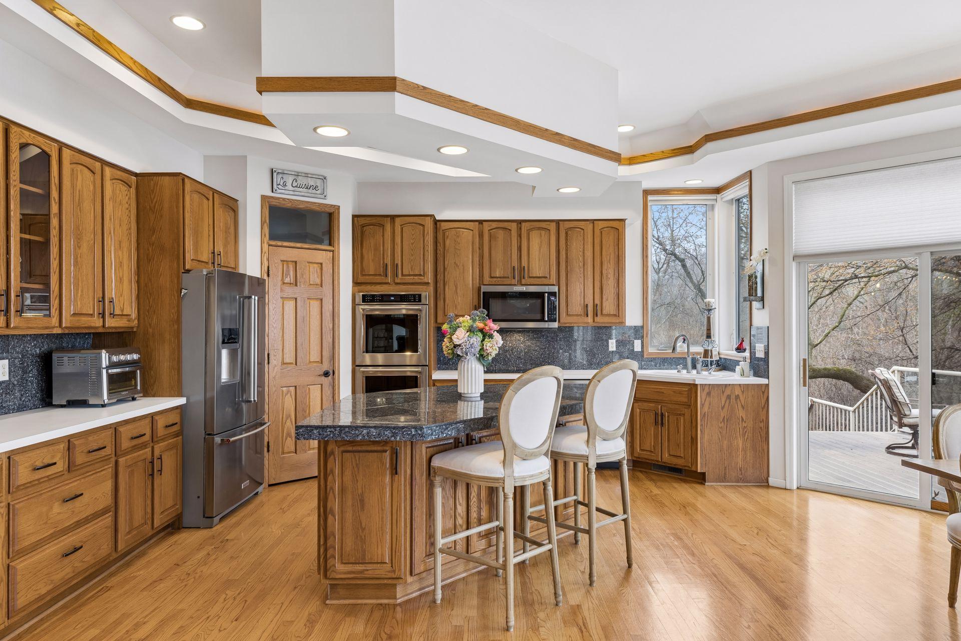 A sliding glass door provides easy access to the deck, seamlessly connecting indoor and outdoor living.