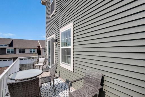 This GIANT deck allows room for everyone...to grill AND chill! *Model home, colors and selections will vary.