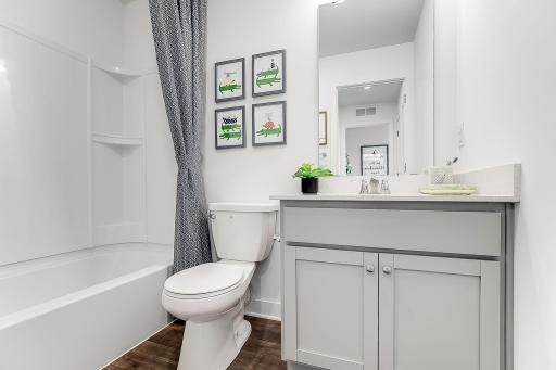 Hall bathroom on the upper level as well. *Model home, colors and selections will vary.