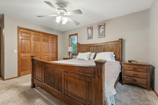 Notice the beautiful woodwork and large space in this primary bedroom.