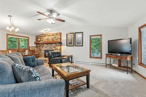 Another view of the living room - lots of windows and sunlight and it connects to the dining area.