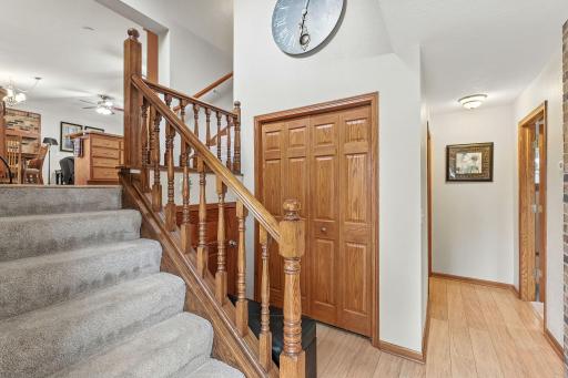 The huge foyer area is so inviting for guests! The steps take you up to the living, dining and kitchen area of the home.