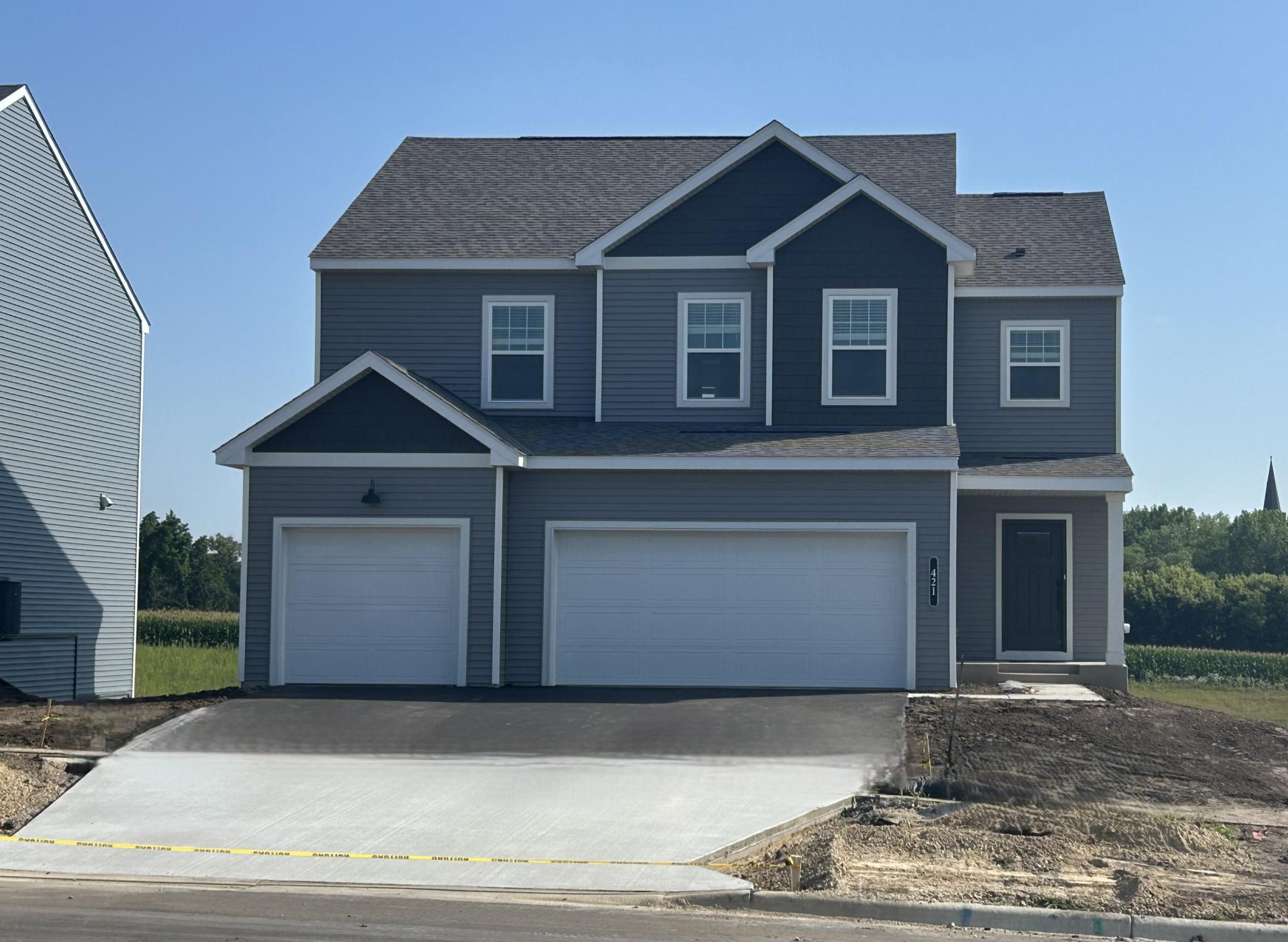 Richmond Plan with 3-car garage - Irrigation, sod, and landscaping will be included.