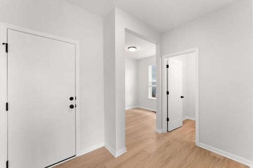 Mudroom conveniently located by main level bathroom, flex room, and access to the 3 car garage.