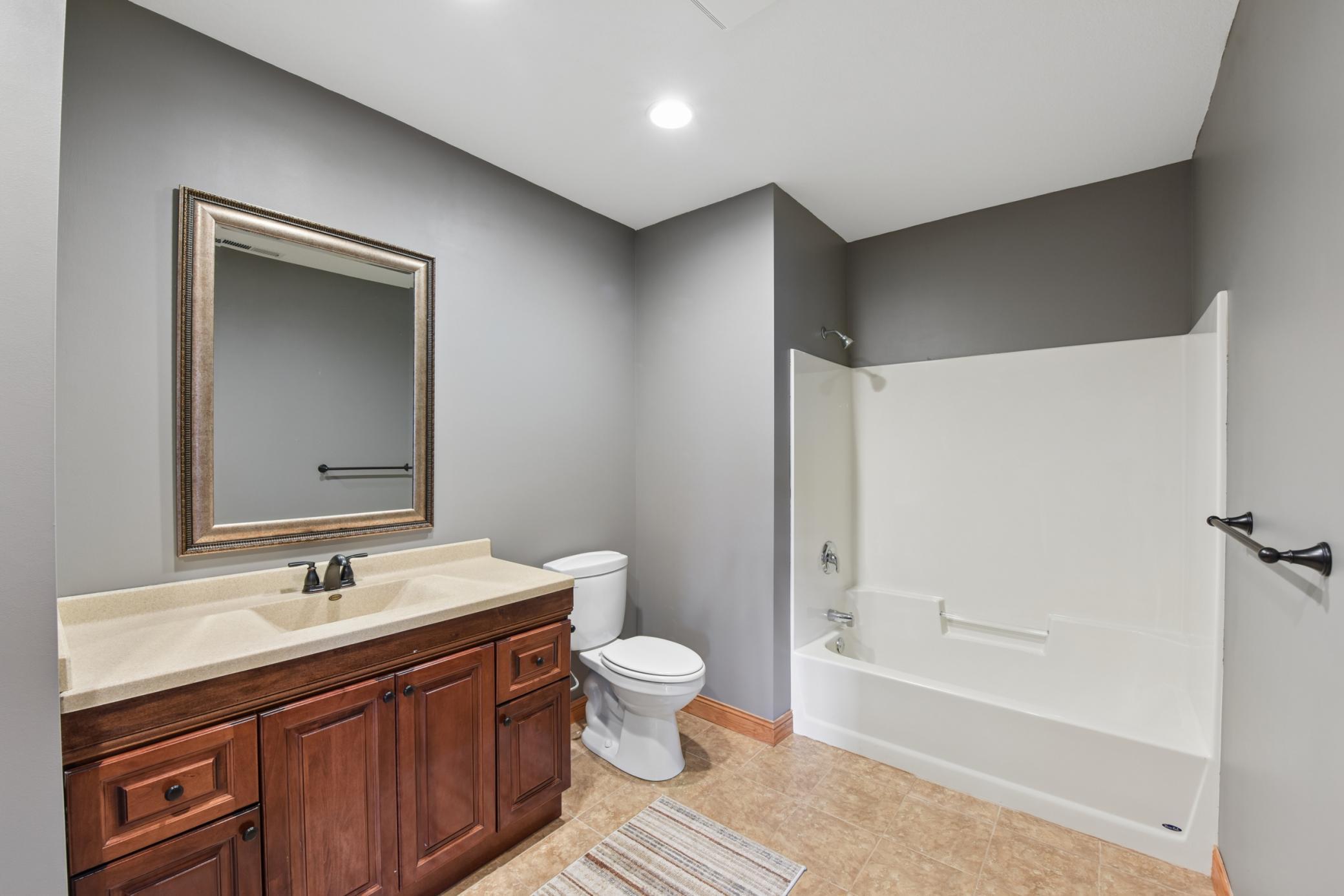 The lower level full bathroom also has plenty of space.