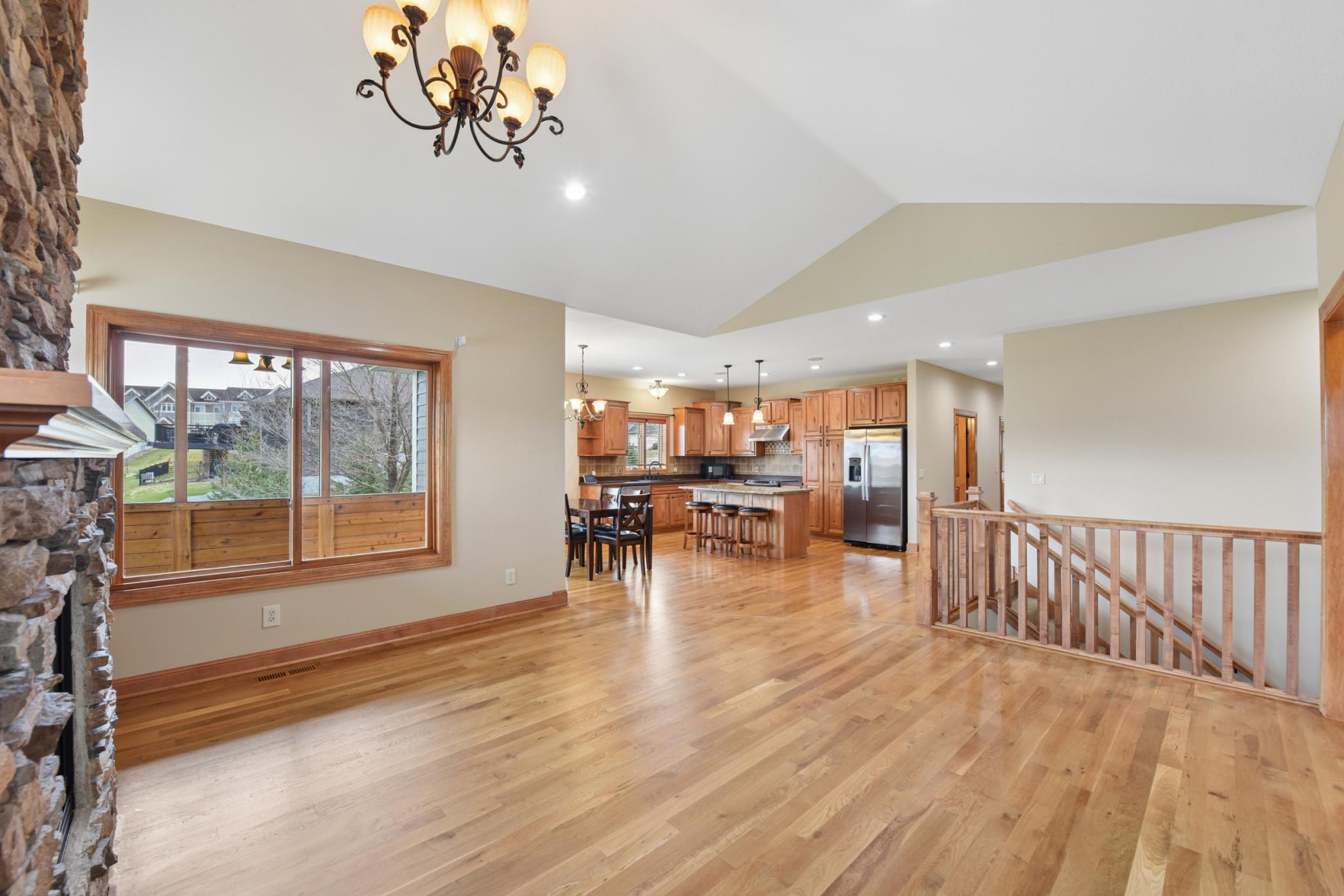 Centrally located to the rest of the home, you will enjoy relaxing by the fireplace or enjoying the activity in the kitchen and dining area.