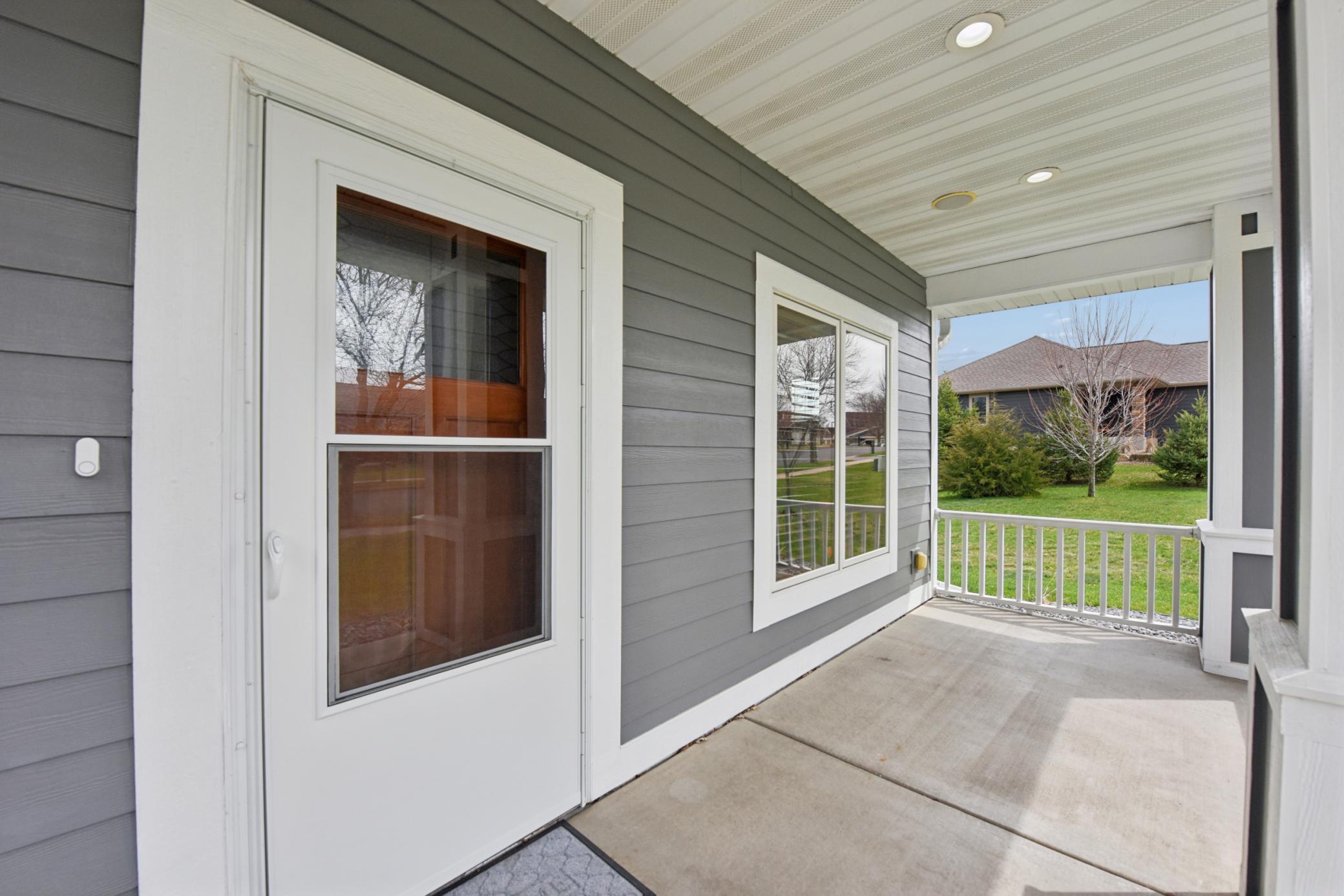 You will enjoy the front patio with zero entry to the main level.