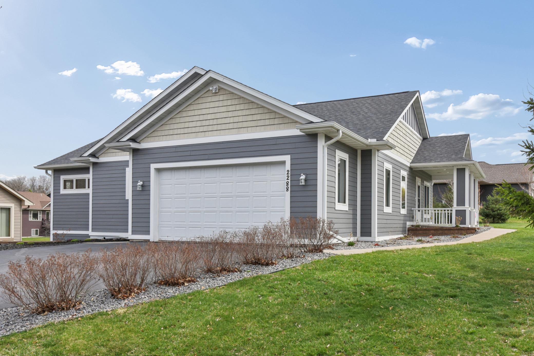 Neat design with the garage off the side of the home.