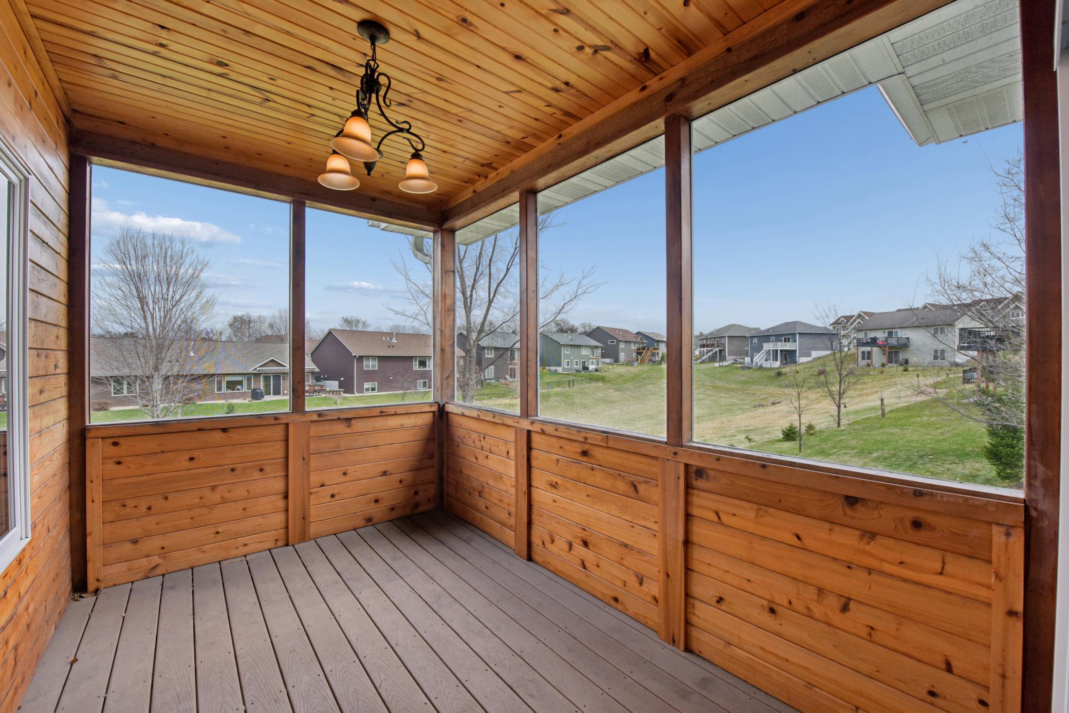 Off the dining area is a nice screened deck. Good space between the neighbors too! You will notice the large water retention area that stays dry most of the year!