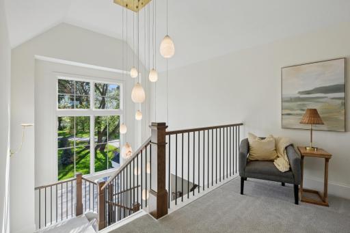 Upper level landing. Incredible Visual Comfort pendant light