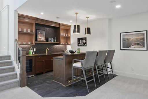 Built out bar, cambra counters, thermador fridges