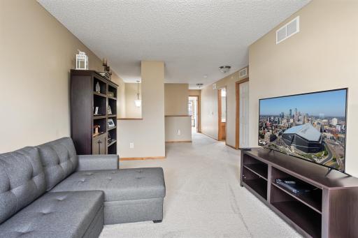 Upper level open concept offers loft, office space.