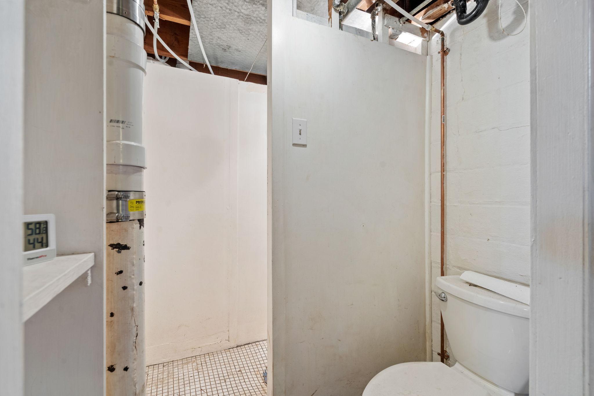 Basement bathroom with working toilet
