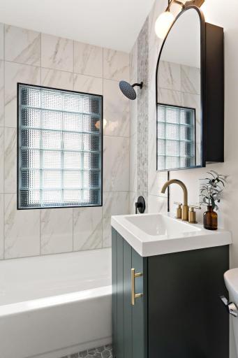 Rainfall shower head and brass faucet with custom vanity