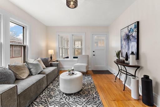 Refinished hardwood floors and natural light flowing in