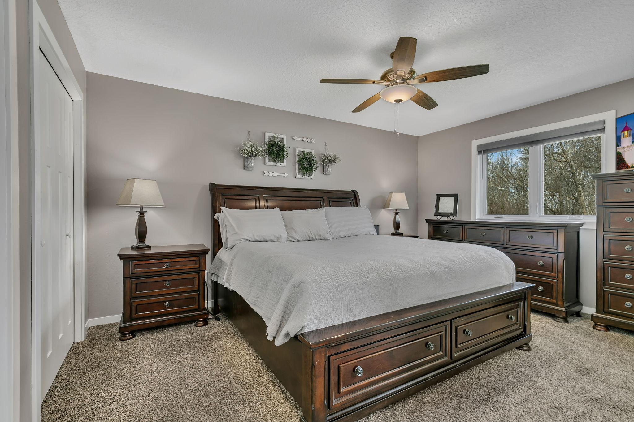 Primary bedroom on main floor with double closets & access to bath