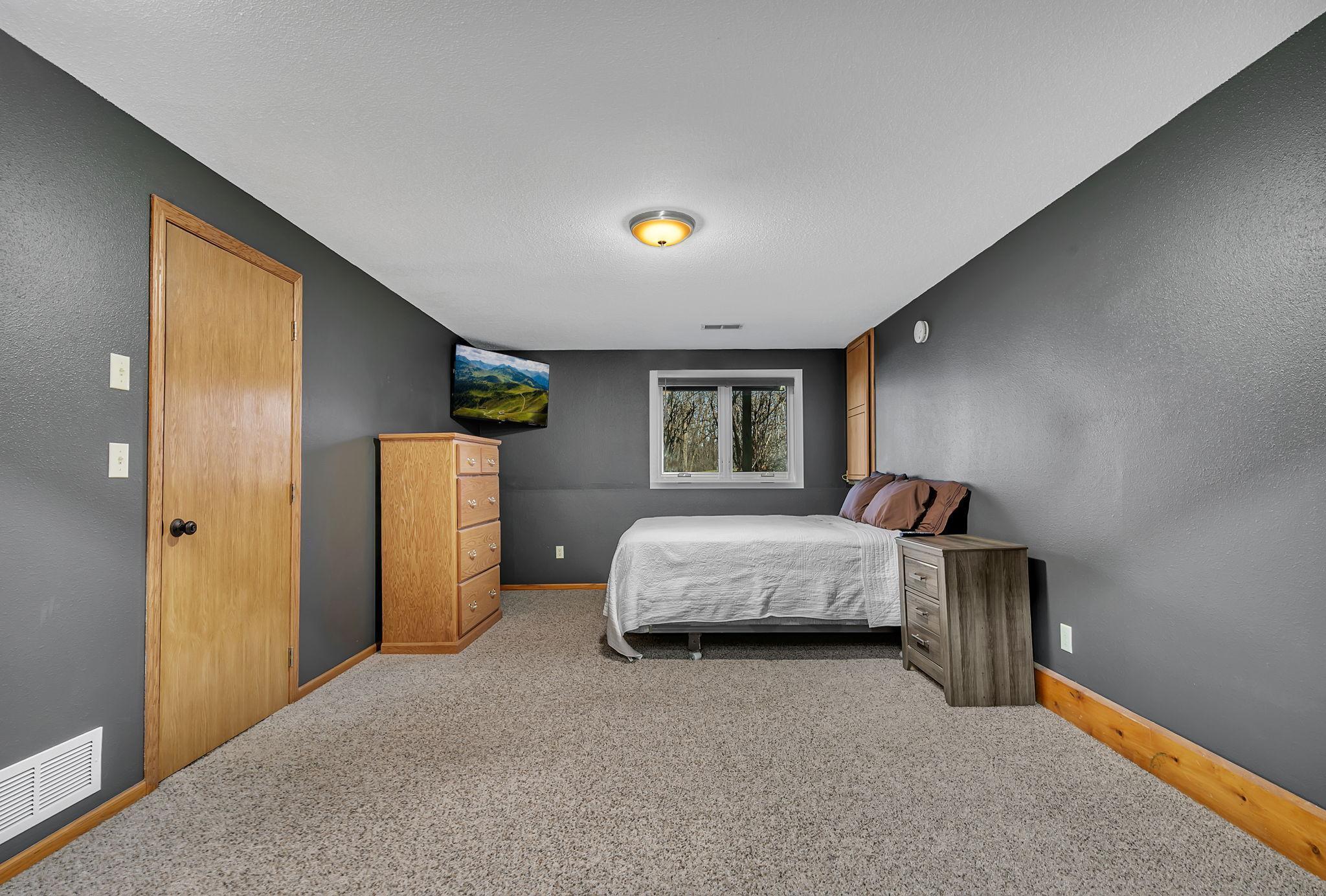 Larger third bedroom in lower level with walk-in closet