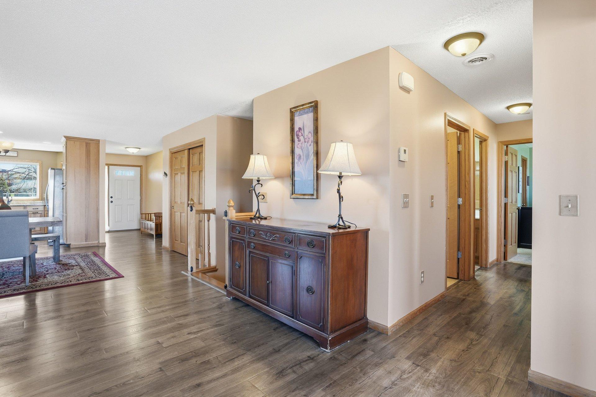 Main floor with entryway & hallway to bedrooms