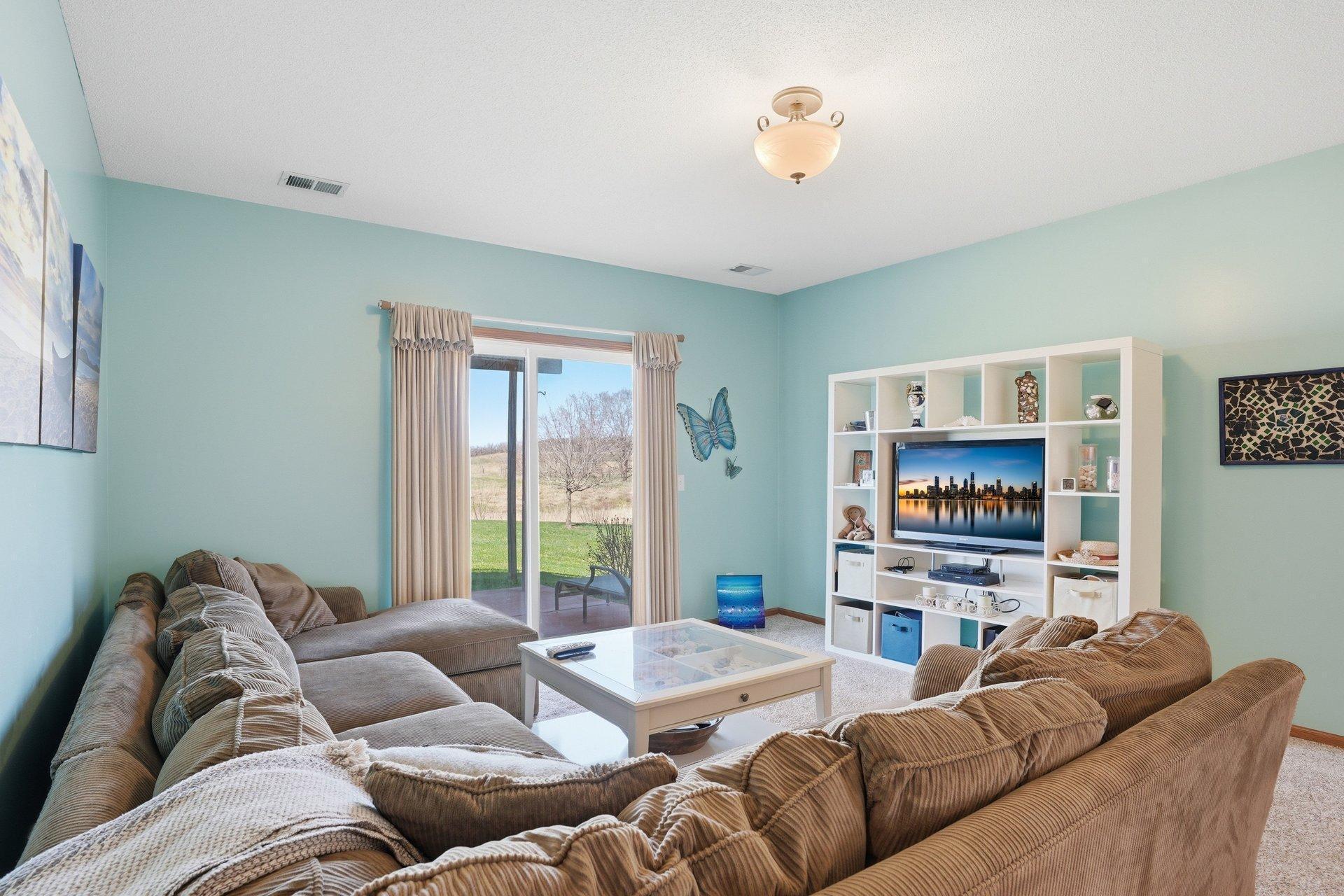 Large gathering space downstairs, walk out to the patio