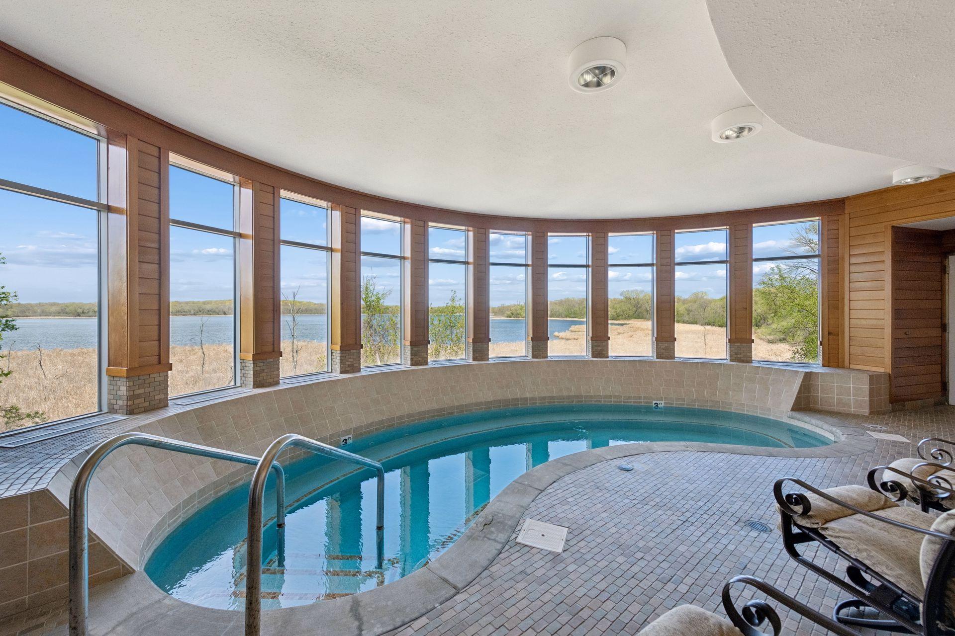 Hot tub inside building with AMAZING views
