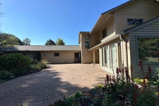 Looking south with the enclosed porch and kitchen on the right.