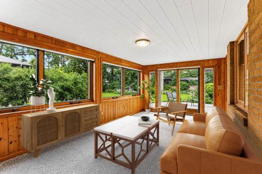 Porch with beautiful picture windows and concrete floor. Add an electric heater to extend the season! 20x11.