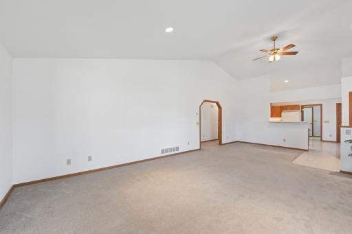 The generously sized living area includes space for a dining room table or hutch