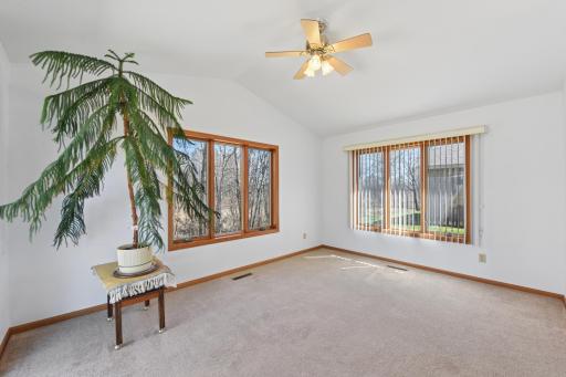 The large windows through out the home bring in natural light and peaceful outdoor views