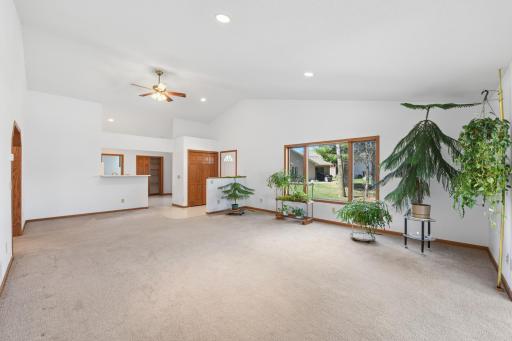 The spacious living room is plumbed for a future fireplace if desired