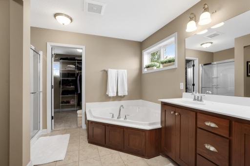 Walk into the perfect closet showcasing beautiful custom woodwork, offering both style and exceptional storage.