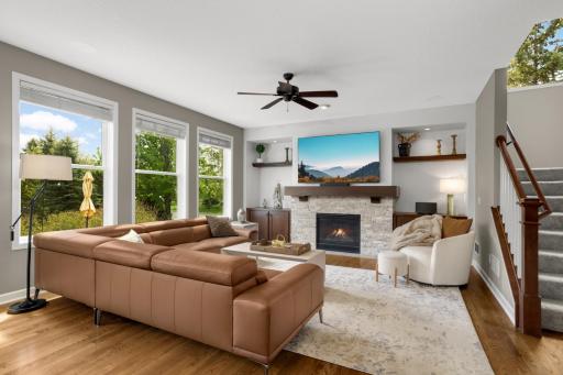Sunlight flows throughout the main level, filling the space with a warm, natural glow from room to room.