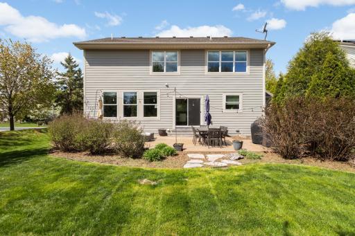 Bring indoor living outside to this great patio and backyard