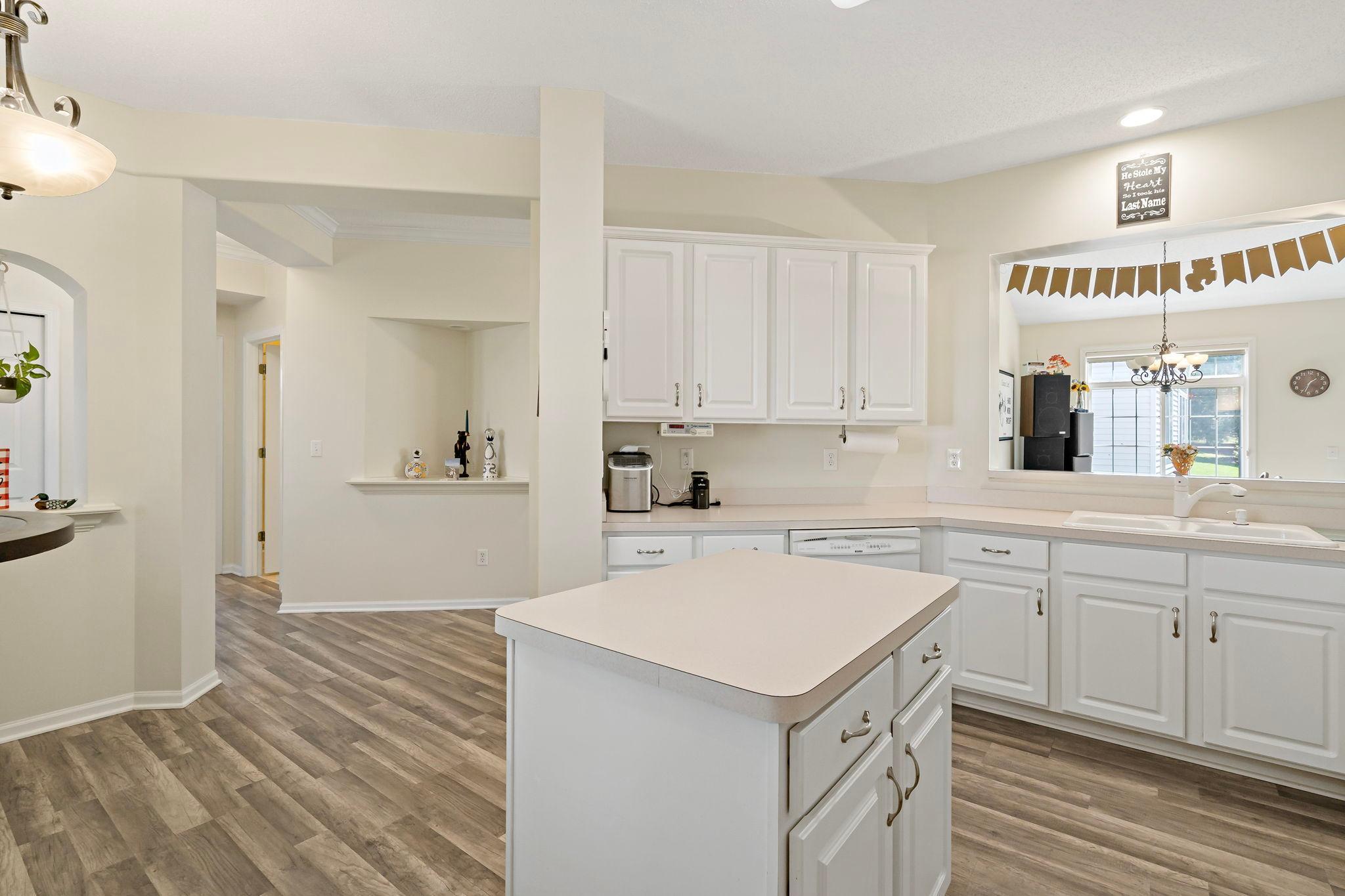 Add in a center island for extra cooking space or for entertaining